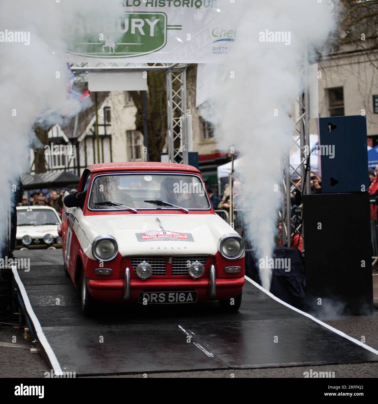 1963 Triumph Herald leaves the start line, Monte Carlo Rallye Historique Stock Photo