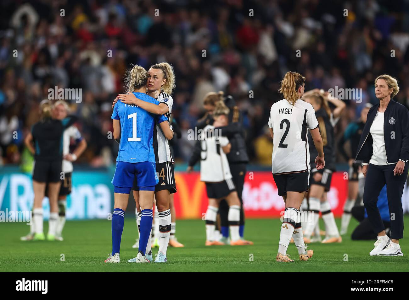 Merle Frohms #1 of Germany and Lena Lattwein #14 of Germany are dejected as Germany are eliminated at the end of the FIFA Women's World Cup 2023 Group H match South Korea vs Germany Women at Suncorp Stadium, Brisbane, Australia, 3rd August 2023 (Photo by Patrick Hoelscher/News Images) Credit: News Images LTD/Alamy Live News Stock Photo