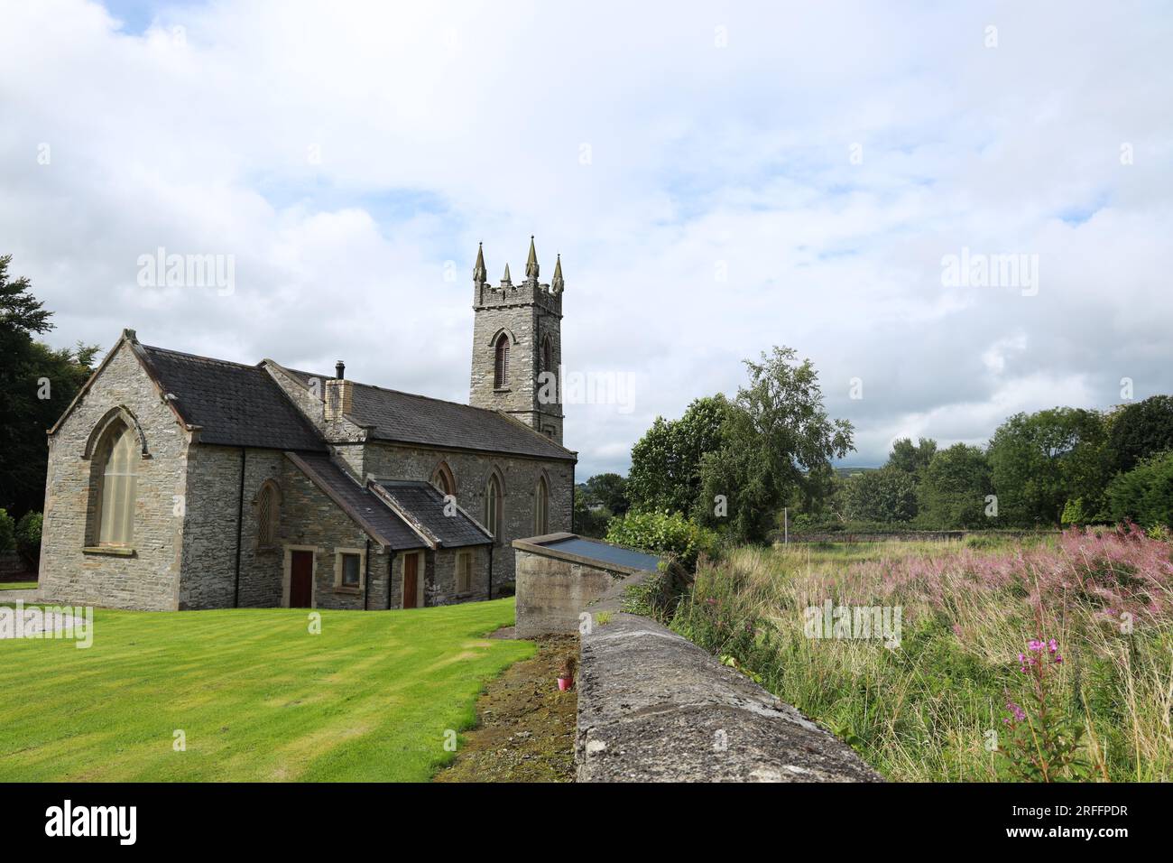 St Mura's Parish Church, a 19th century Church of Ireland church pictured here in summertime sunlight. Fahan, County Donegal, Ireland Stock Photo