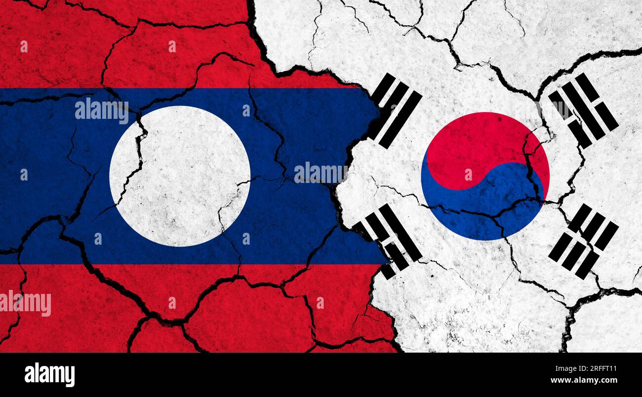 Flags of Laos and South Korea on cracked surface - politics ...