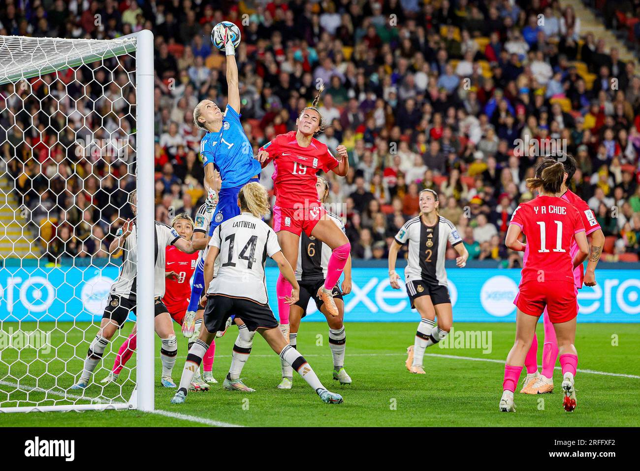 Merle Frohms (1) of Germany punches clear from Casey Phair (19) of Korea Republic during the 2023 FIFA Womenâ&#x80;&#x99;s World Cup, Group H football match between Korea Republic and Germany on 3 August 2023 at Brisbane Stadium in Brisbane, Australia Stock Photo