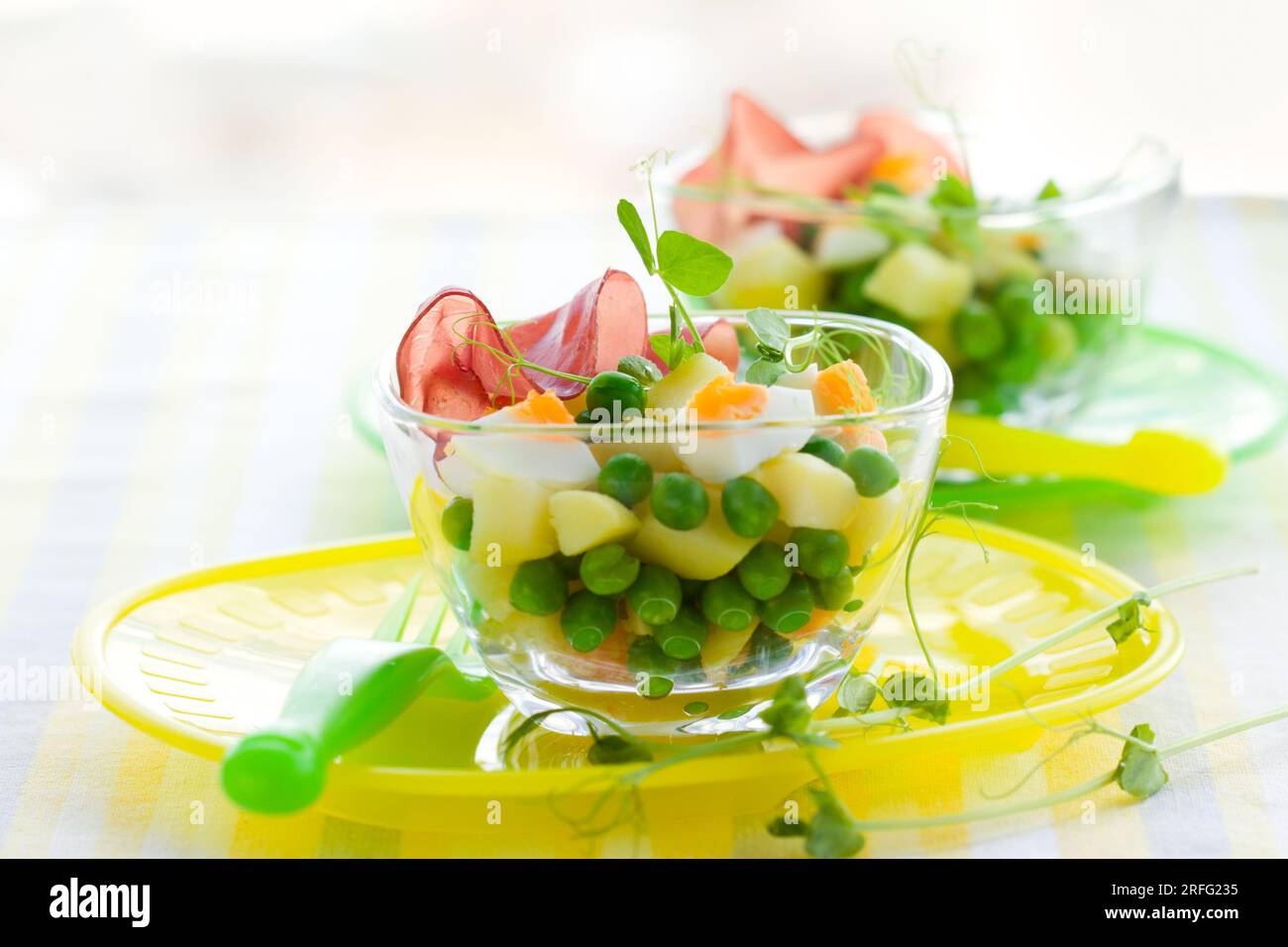 spring salad witn potato,egg, pea and ham Stock Photo