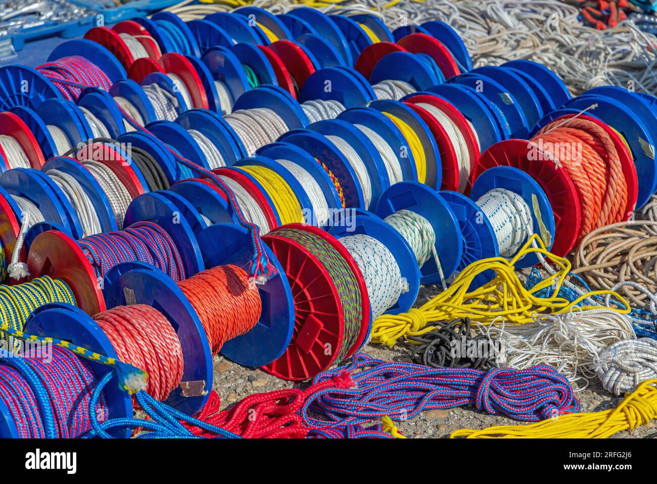 Colourful Nylon Polymer Sunthetic Fibres Ropes at Reels Coils Variety Stock Photo