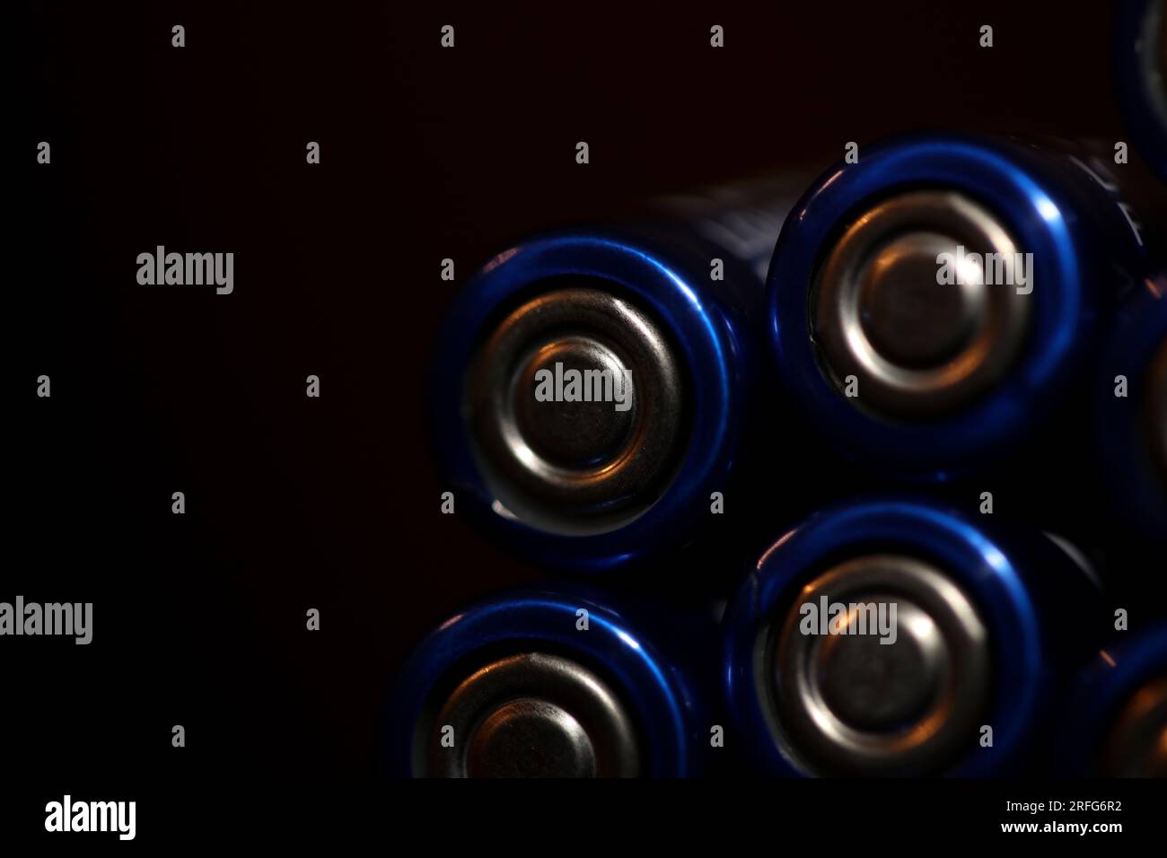 Close up background of various alkaline rechargeable batteries AA for modules mass production accumulators high power and energy for electric vehicles Stock Photo