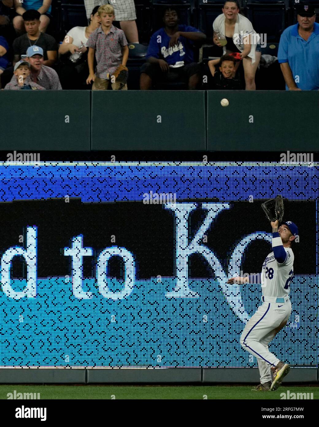 Kansas City Royals center fielder Kyle Isbel catches a fly ball during the  eighth inning of a baseball game against the New York Mets Wednesday, Aug.  2, 2023, in Kansas City, Mo. (