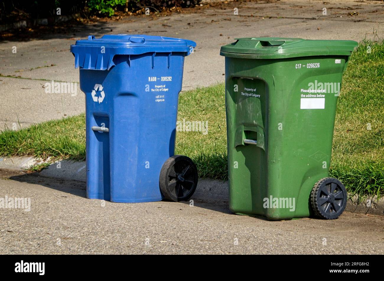 blue cart, green cart Calgary Alberta Stock Photo Alamy