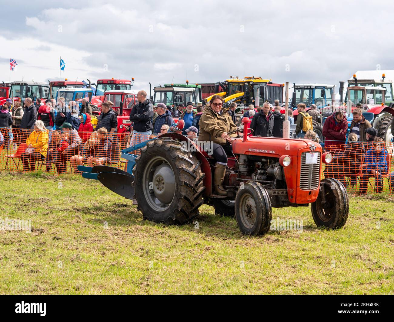 Classic Massey Ferguson tractor and plough at a Vintage Tractor show in