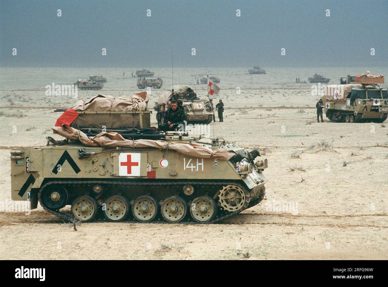 KUWAIT - 28 February 1991 - Armoured medical vehicles of the British Army's 7th Brigade Royal Scots, 1st Armoured Division, are positioned north of th Stock Photo