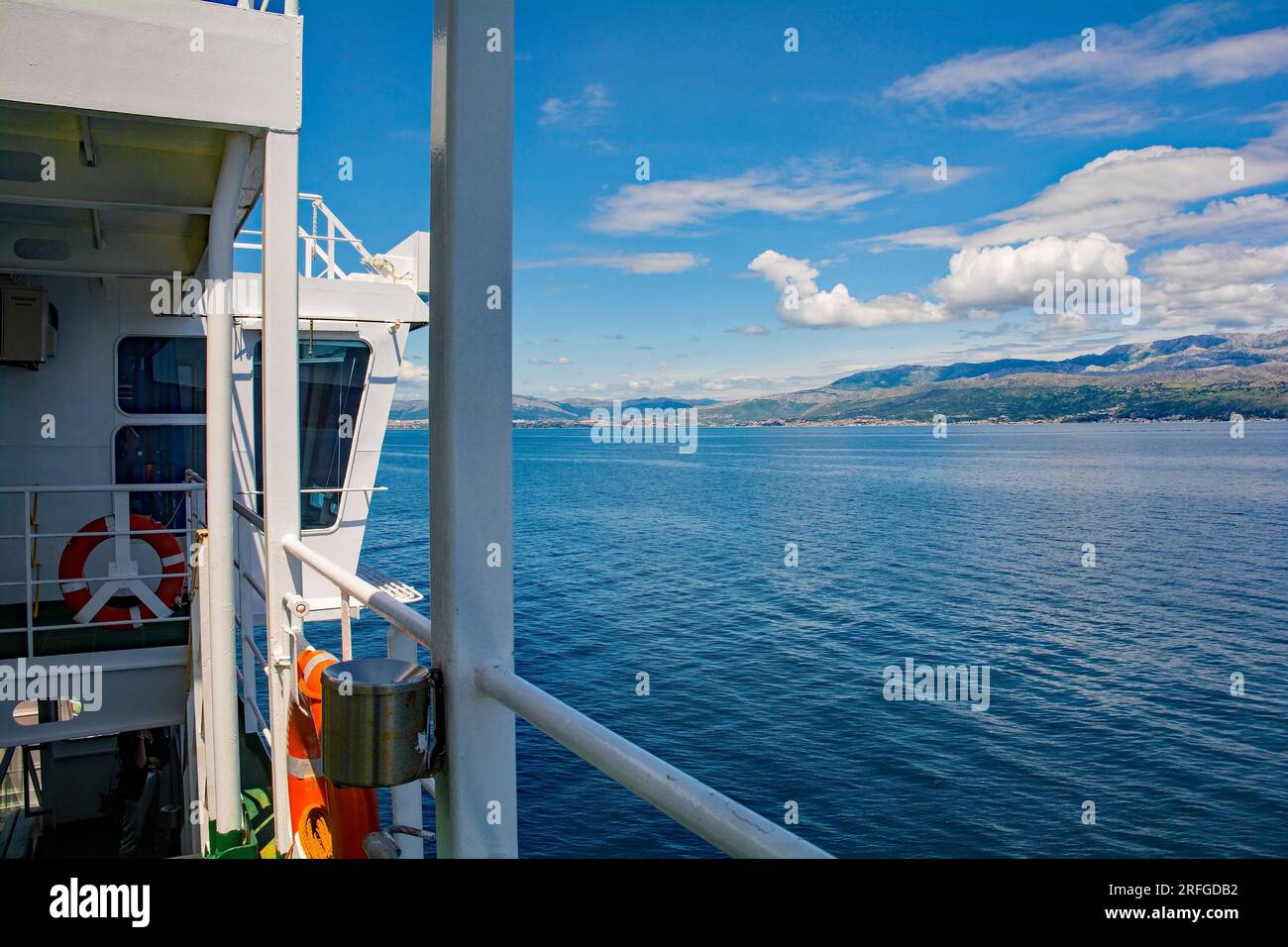 A car and passenger ferry travelling from Supetar on Brac Island to ...