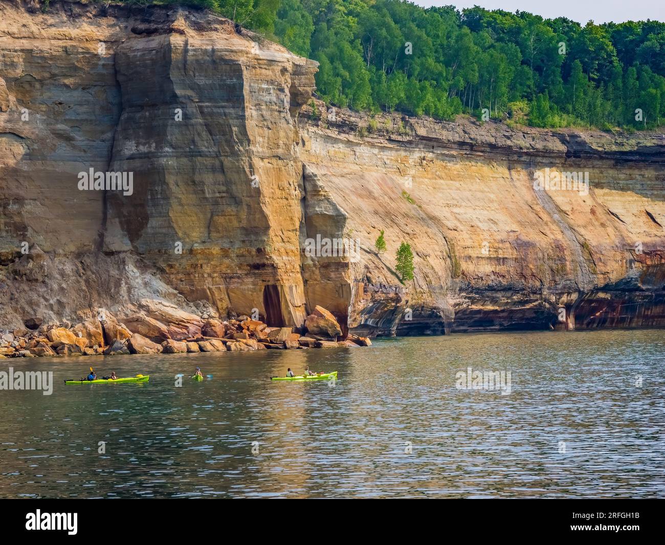 Kayakers in Pictured Rocks National Lakeshore on Lake Superior on the Upper Peninsula of Michigan USA Stock Photo