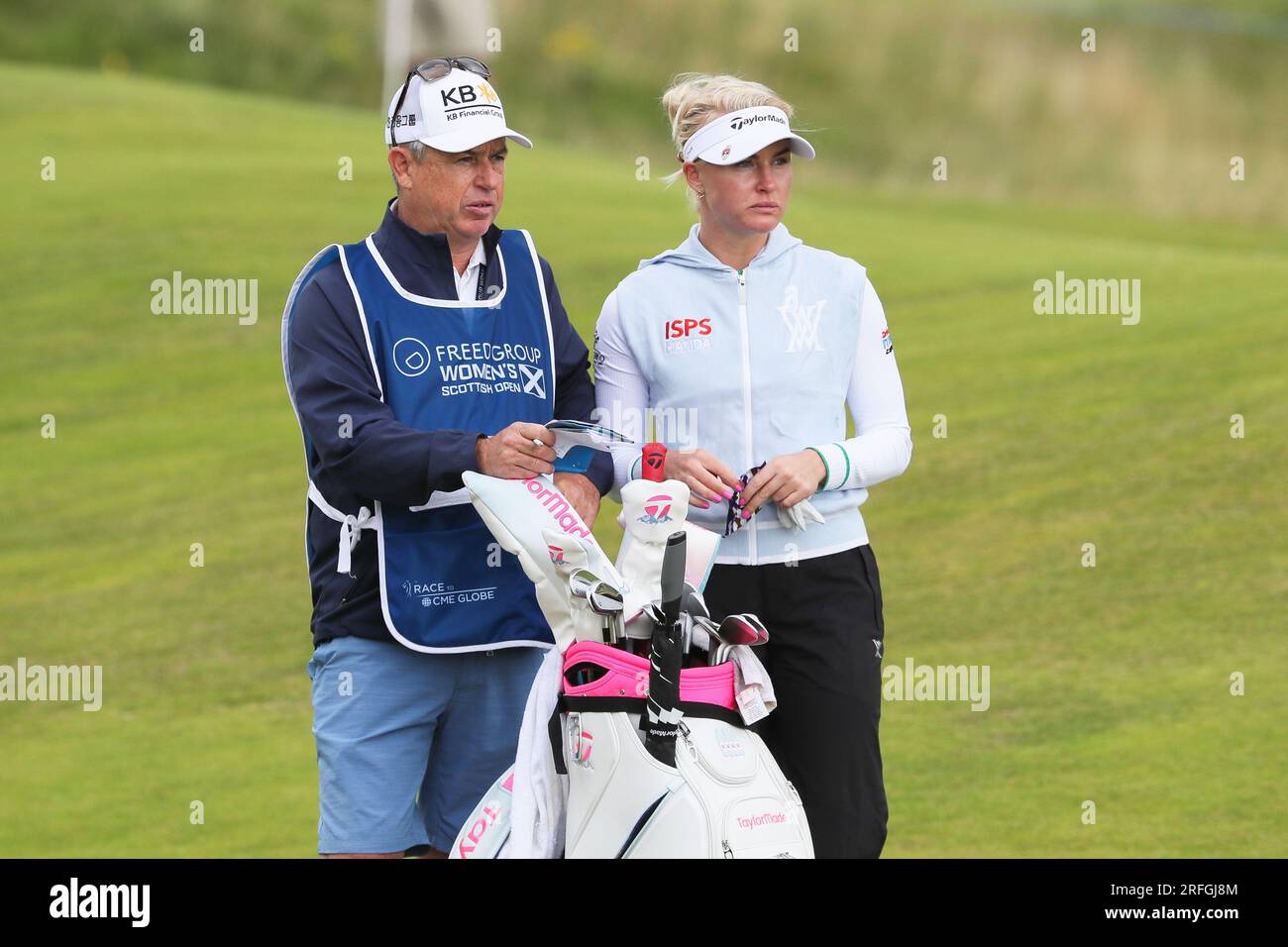 Irvine, UK. 03rd Aug, 2023. One day 1 of the Women's Scottish Open Golf tournament, an international field of 145 competitors began teeing off at Dundonald Links Golf Course, near Irvine, Ayrshire Scotland, UK. The competition, over 4 days is for a purse of $3,000,000 and the cut after the second round will be for the top 65 and ties. Charlie Hull and caddie on the 3rd fairway. Credit: Findlay/Alamy Live News Stock Photo