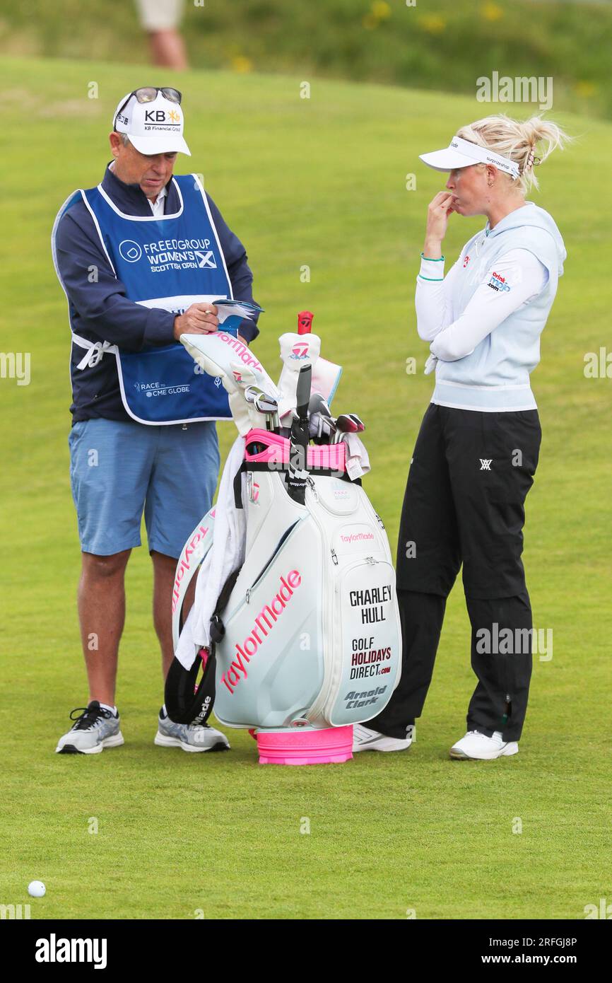 Irvine, UK. 03rd Aug, 2023. One day 1 of the Women's Scottish Open Golf tournament, an international field of 145 competitors began teeing off at Dundonald Links Golf Course, near Irvine, Ayrshire Scotland, UK. The competition, over 4 days is for a purse of $3,000,000 and the cut after the second round will be for the top 65 and ties. Charlie Hull and caddie on the 3rd fairway. Credit: Findlay/Alamy Live News Stock Photo