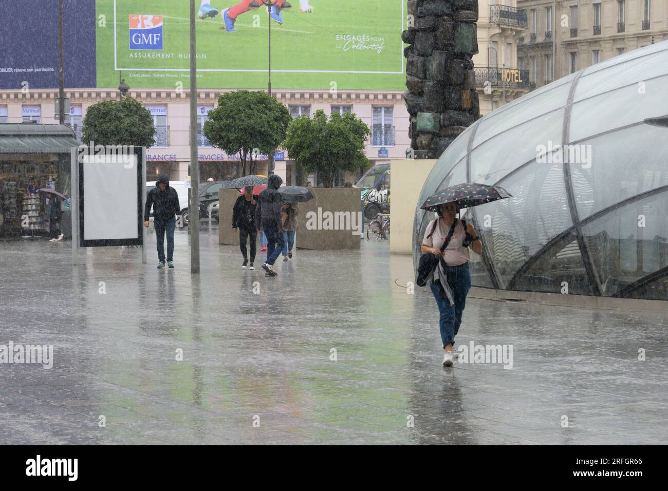 Paris, France. 03rd Aug, 2023. People exit Paris Saint Lazare train