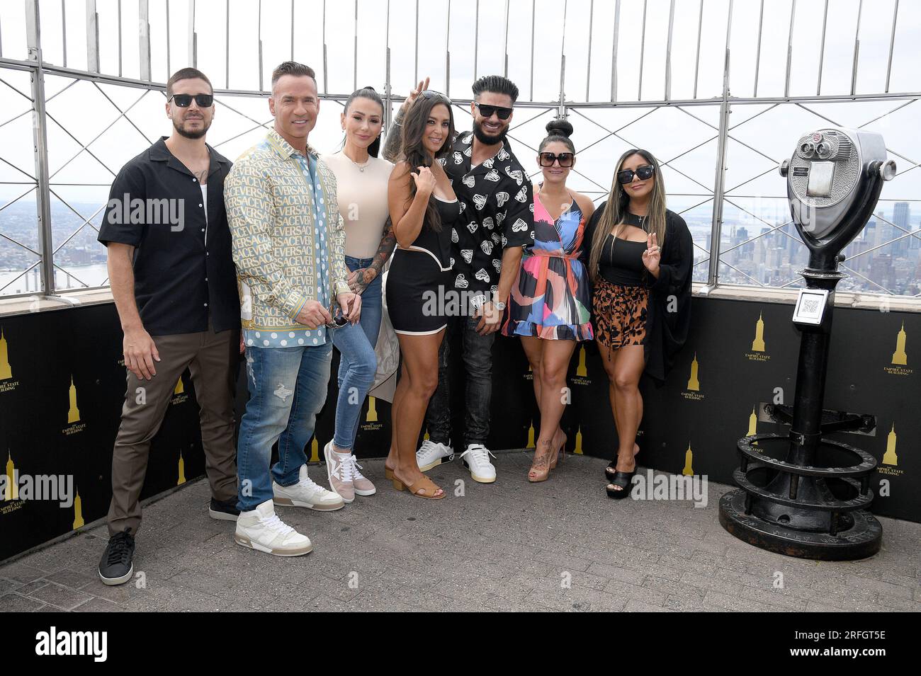 New York, USA. 03rd Aug, 2023. 'Jersey Shore Family Vacation' cast members (l-r) Vinny Guadagnino, Mike 'The Situation' Sorrentino, Jenni 'JWOWW' Farley, Sammi 'Sweetheart' Giancola, Paul 'DJ Pauly D' DelVecchio, Deena Nicole Cortese and Nicole 'Snooki' Polizzi visit the Empire State Building, New York, NY, August 3, 2023. (Photo by Anthony Behar/Sipa USA) Credit: Sipa USA/Alamy Live News Stock Photo