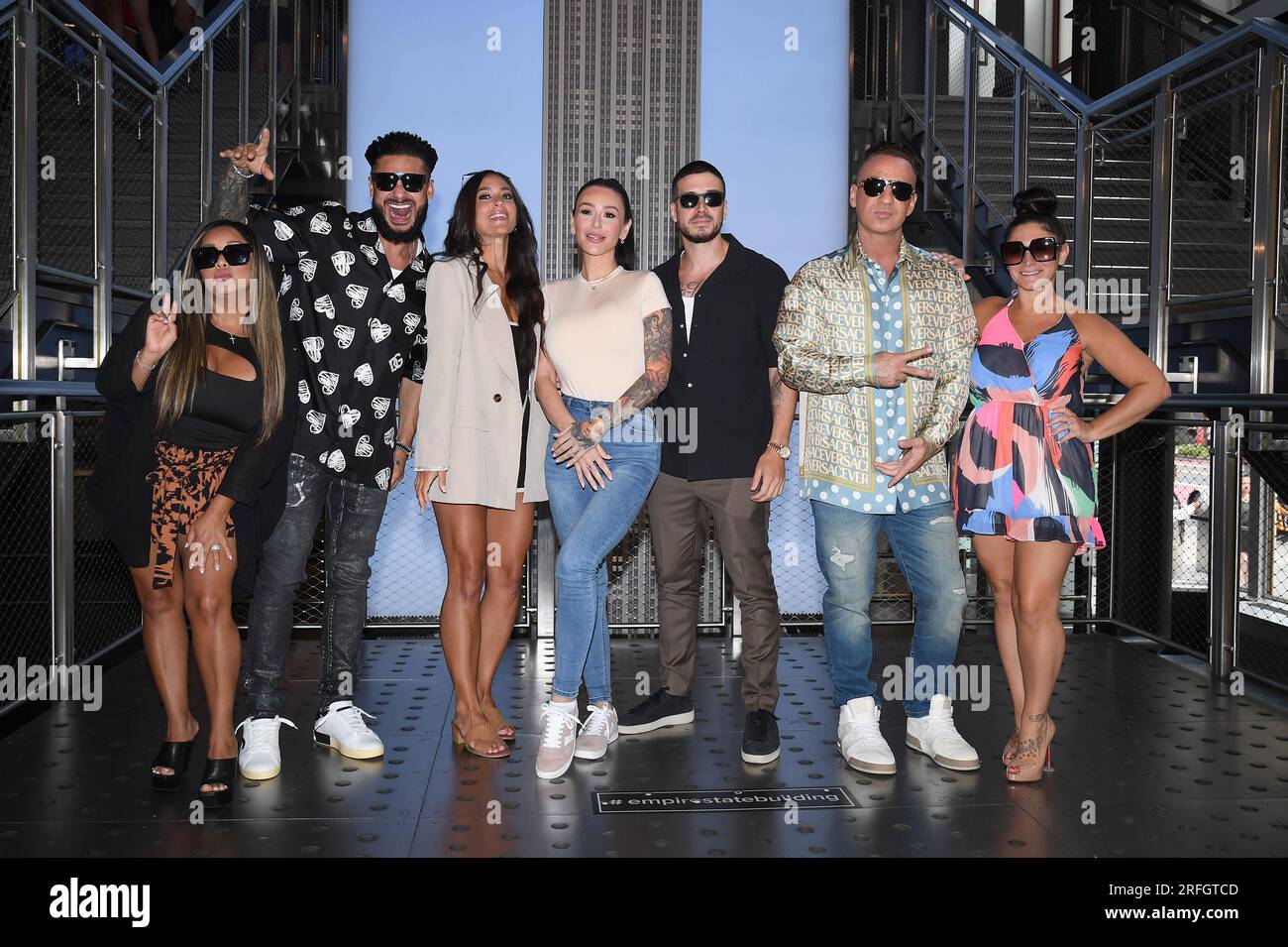 New York, USA. 03rd Aug, 2023. ‘Jersey Shore Family Vacation' cast members (l-r) Nicole ‘Snooki' Polizzi, Paul 'DJ Pauly D' DelVecchio, Sammi 'Sweetheart' Giancola, Jenni 'JWOWW' Farley, Vinny Guadagnino, Mike ‘The Situation' Sorrentino, and Deena Nicole Cortese visit the Empire State Building, New York, NY, August 3, 2023. (Photo by Anthony Behar/Sipa USA) Credit: Sipa USA/Alamy Live News Stock Photo