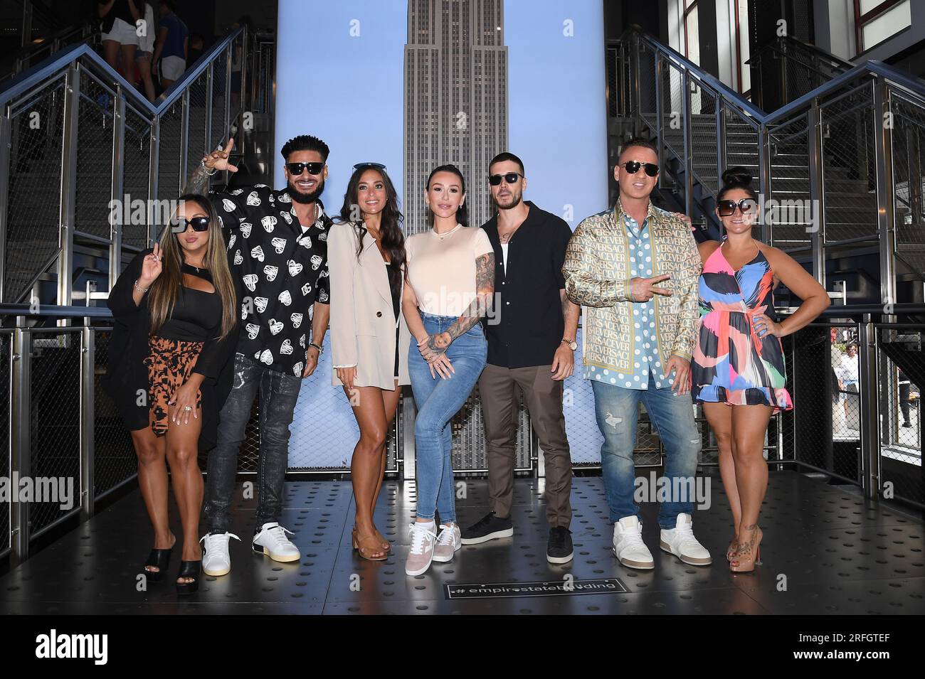 New York, USA. 03rd Aug, 2023. ‘Jersey Shore Family Vacation' cast members (l-r) Nicole ‘Snooki' Polizzi, Paul 'DJ Pauly D' DelVecchio, Sammi 'Sweetheart' Giancola, Jenni 'JWOWW' Farley, Vinny Guadagnino, Mike ‘The Situation' Sorrentino, and Deena Nicole Cortese visit the Empire State Building, New York, NY, August 3, 2023. (Photo by Anthony Behar/Sipa USA) Credit: Sipa USA/Alamy Live News Stock Photo