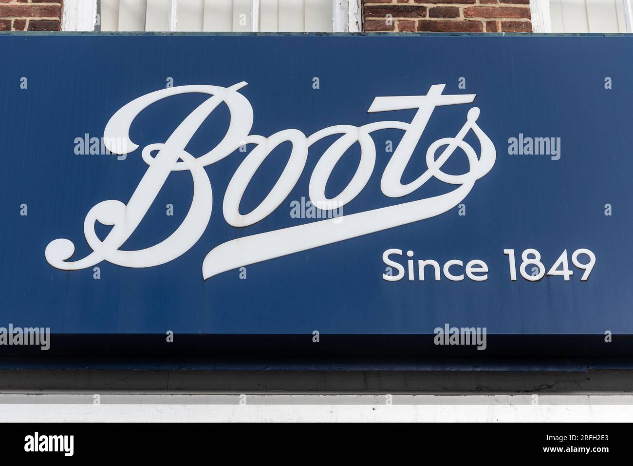 Boots since 1849 sign or signage above Boots the Chemist shop, England, UK Stock Photo