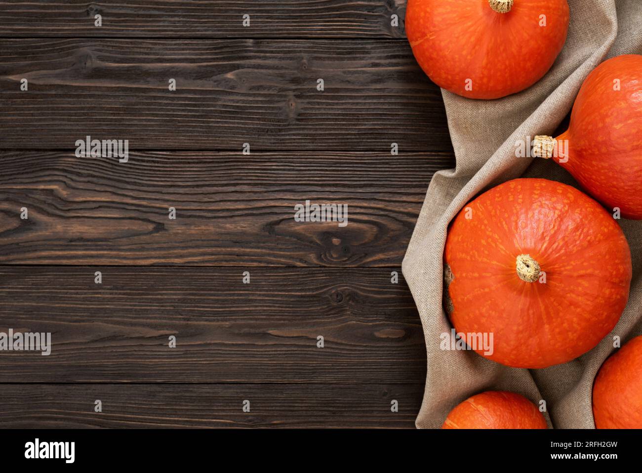 Uchiki Kuri Squash on a Vintage Wooden Background with Copy Space Stock Photo