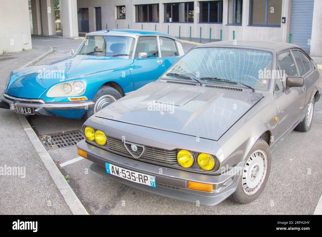 Lion, France - 14.10.2017: Vintage cars on the streets as a new fashion for car owners. Alfa Romeo and Citroen ds21 Stock Photo