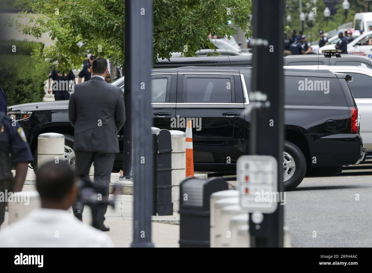 Washington, United States. 03rd Aug, 2023. A motorcade carrying former President Donald Trump to his arraignment in Federal Court arrives at the E. Barrett Prettyman United States Courthouse on August 3, 2023 in Washington, DC. On Tuesday Special Counsel Jack Smith announced that a Grand Jury has indicted the former President on four criminal counts of using 'unlawful means of discounting legitimate votes and subverting the election results.' (Photo by Samuel Corum/Sipa USA) Credit: Sipa USA/Alamy Live News Stock Photo