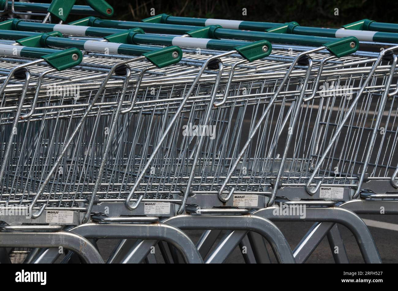 Shopping trolleys stack in Morrisons supermarket car park Stock Photo