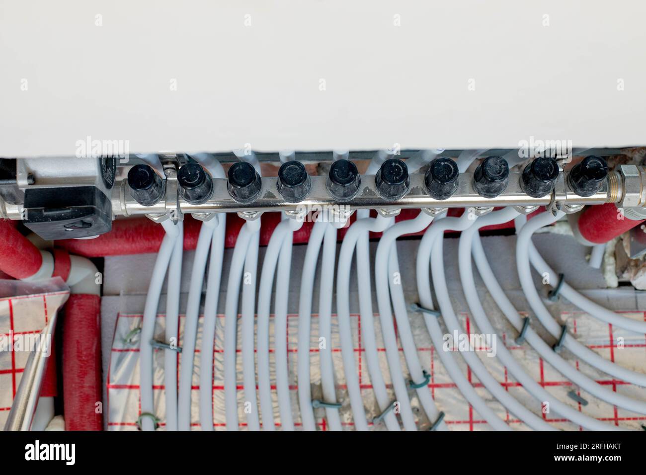 Install system Manifold Assembly of underfloor heating at home Stock