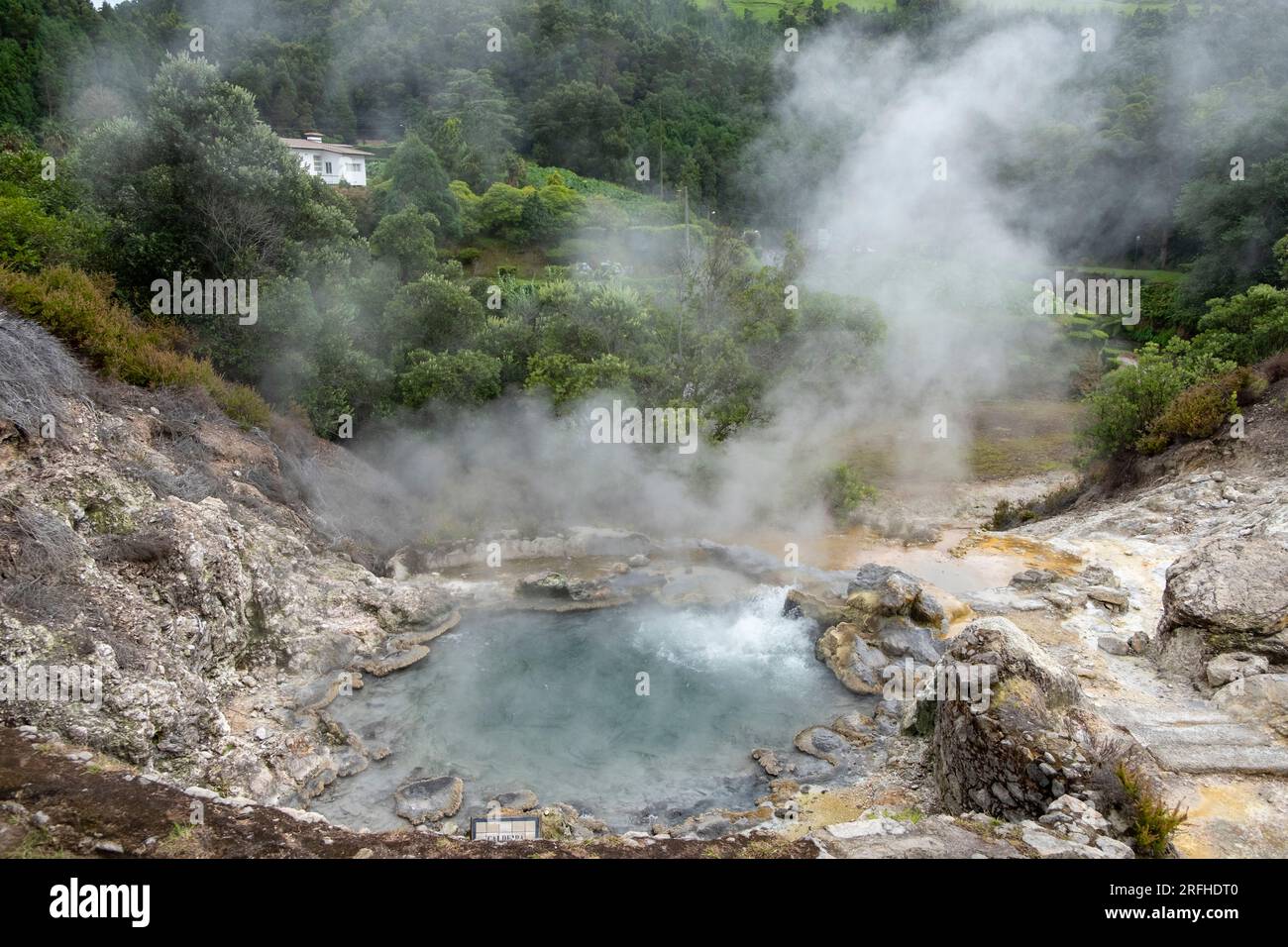 Volcanic Hot spring in Furnas with hot boiling water and vapor gases