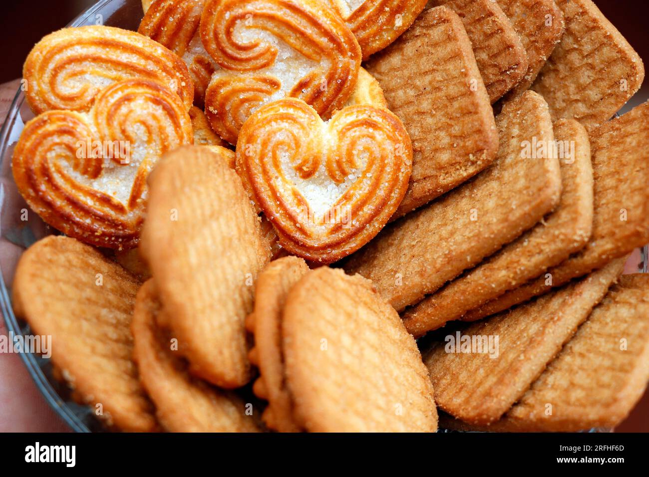high calorie food sweet sugary cookies or biscuit in close up Stock Photo