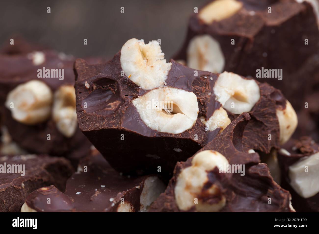 homemade bitter chocolate bar with roasted hazelnuts, bitter chocolate