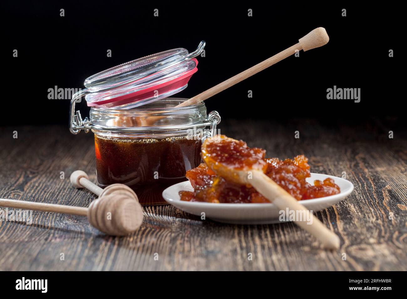 honey from long storage turned from liquid to solid, crystallized and