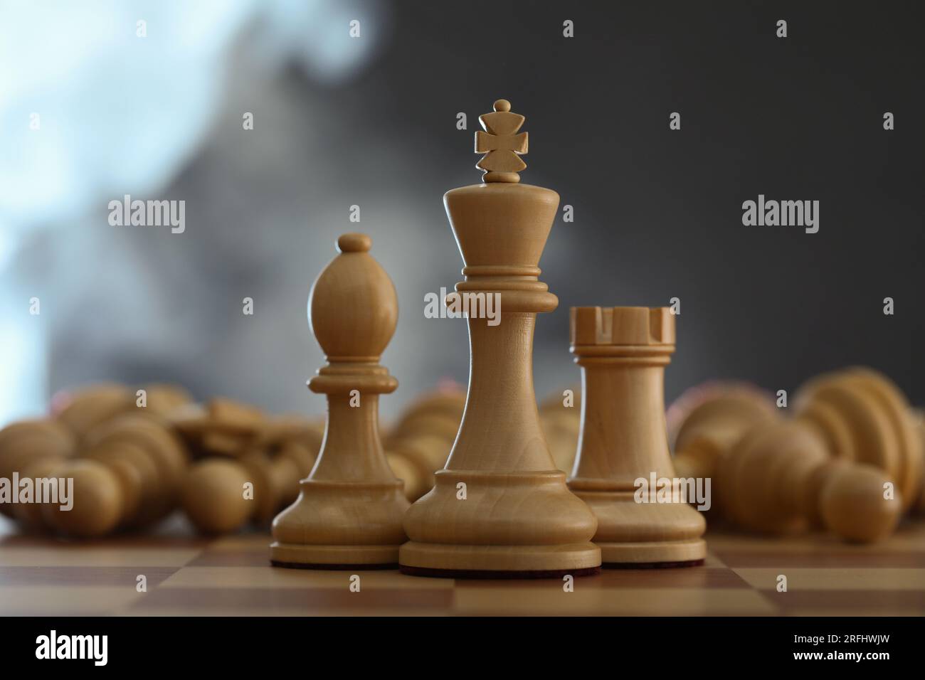 Golden Chess King In Front Of A Checkered Board Stock Photo