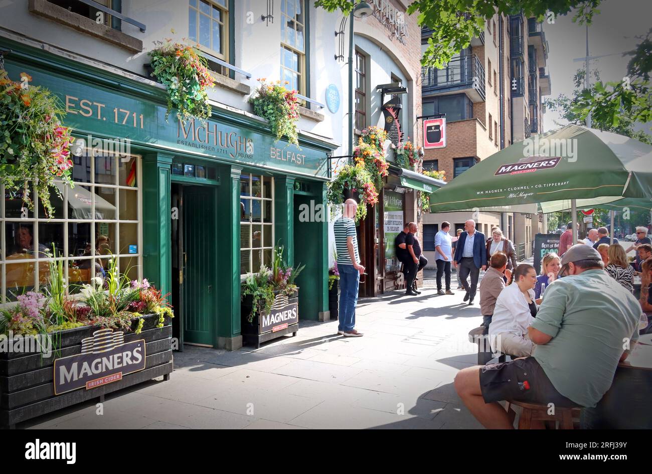 Outdoor seating area at McHugh’s Bar, established in 1711, in Belfast city centre, Northern Ireland, UK Stock Photo