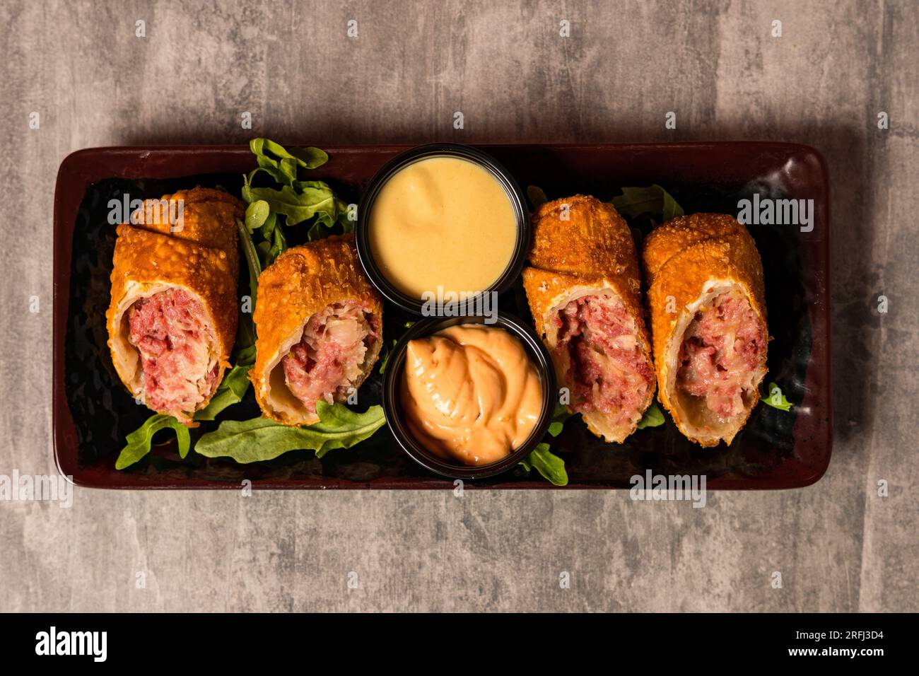 Pastrami and sauerkraut egg rolls Stock Photo Alamy