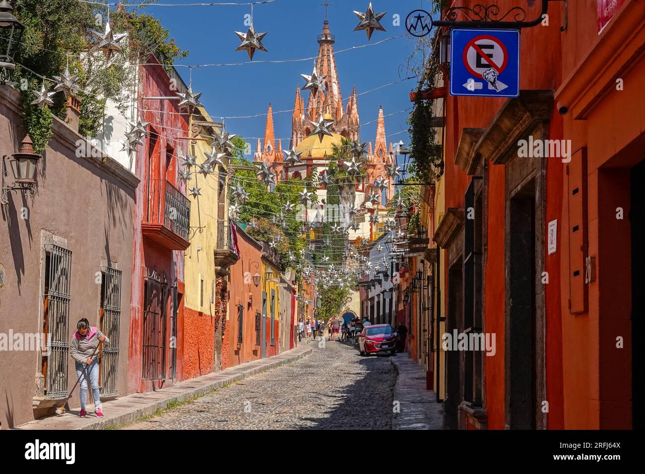 Mexican tin stars strung across the the cobblestone Calle Aldama with