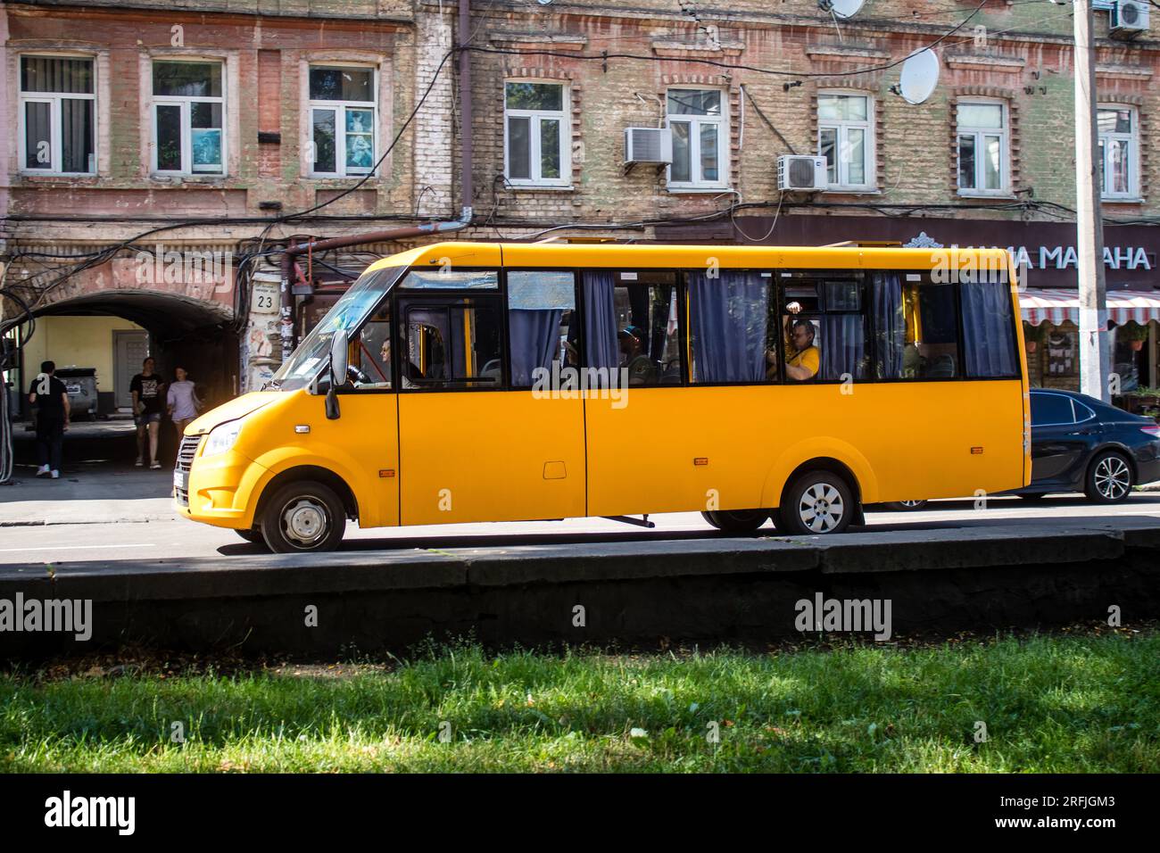 Ukraine Bus Kyiv, Ukraine - August 01, 2023 Local bus rolling in downtown Kyiv ...