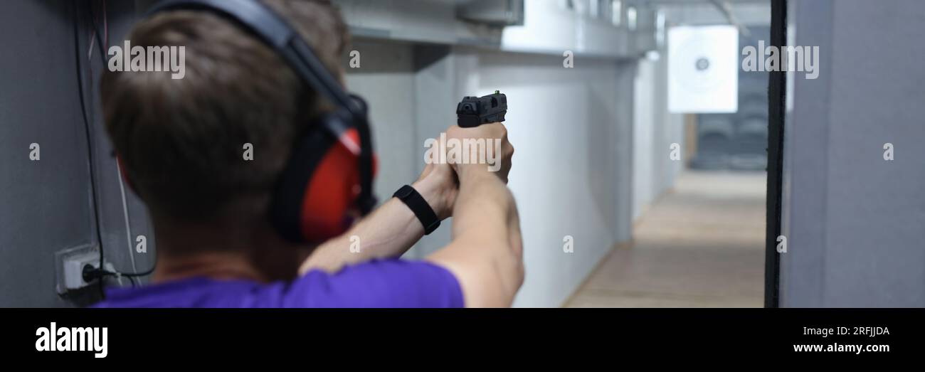 Gun Range Intructure Shooter and instructor at shooting range Stock Photo - Alamy