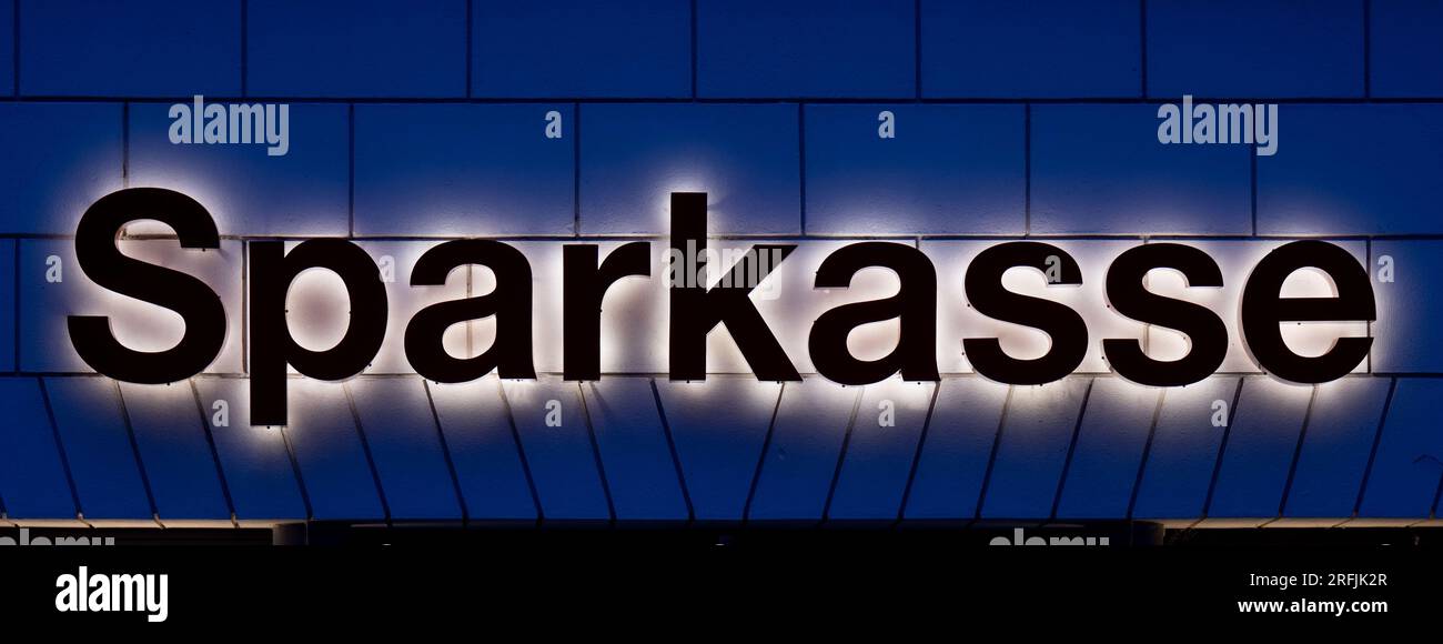 Wittenberg, Germany. 04th Aug, 2023. The Sparkasse's lettering shines