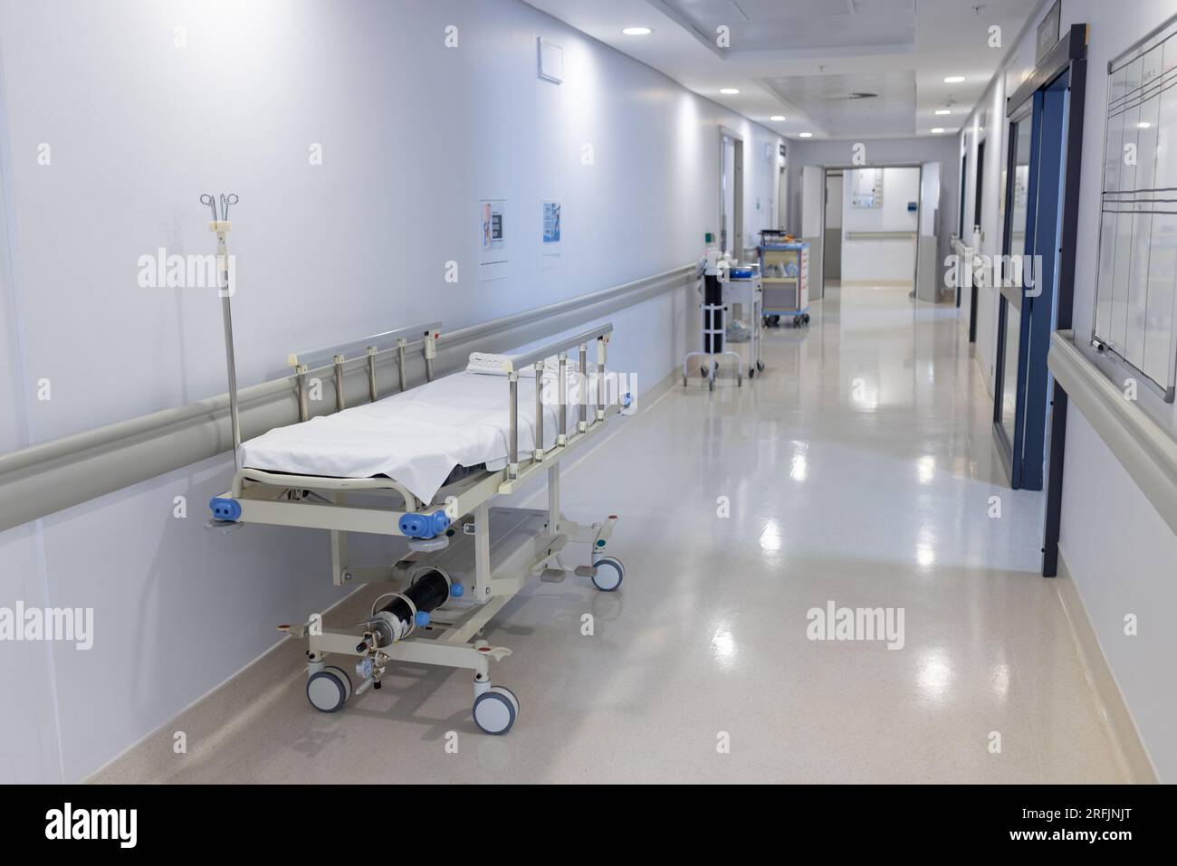 General view of corridor with beds and medical equipment at hospital Stock Photo