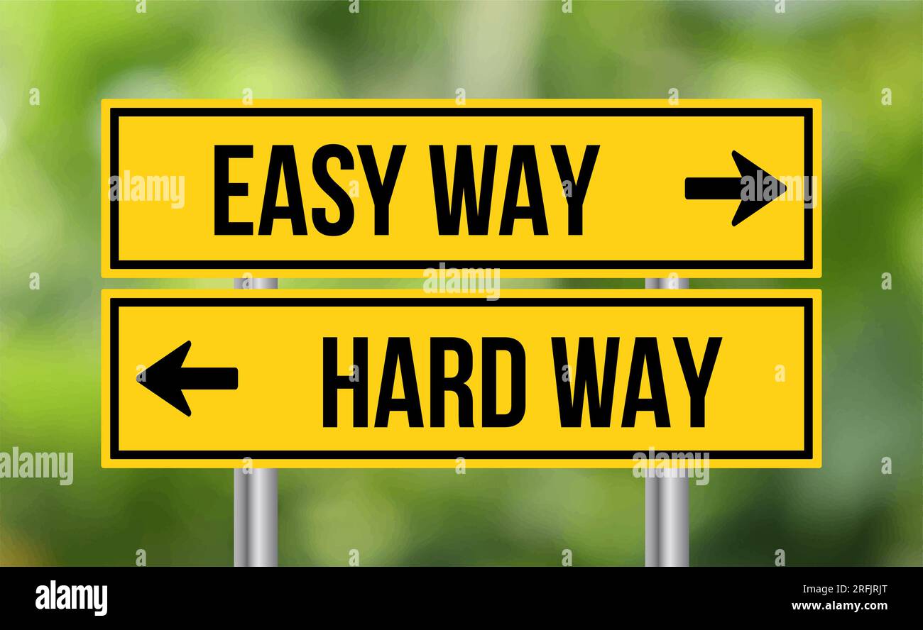 Easy way or hard way road sign on blur background stock photo alamy