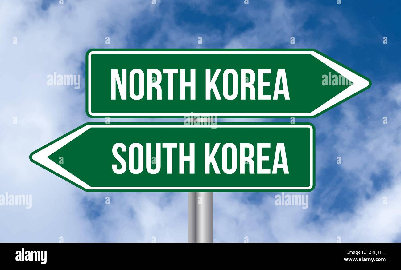 North korea or south korea road sign on blue sky background Stock Photo ...