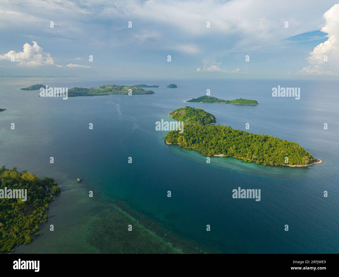 Islands surrounded by azure water and corals. Zamboanga City. Mindanao