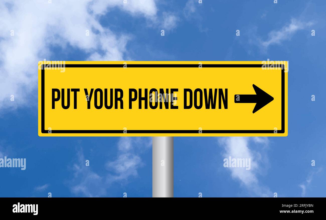 Put your phone down road sign on cloudy sky background Stock Photo - Alamy