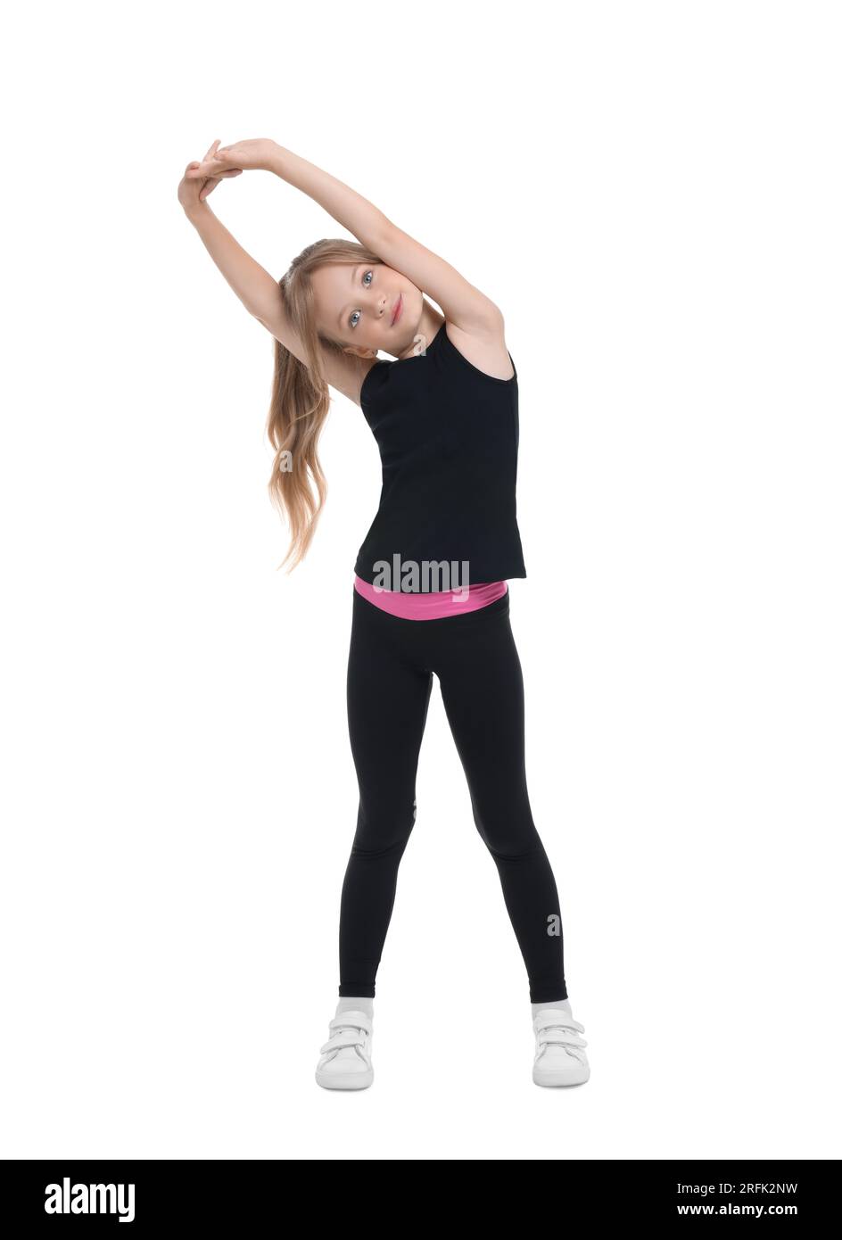 Little girl doing morning exercise on white background Stock Photo - Alamy