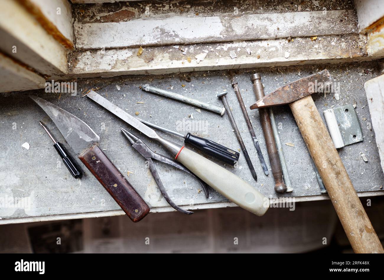 Repairing old damaged window or dismantling before installing new, closeup. Repairing a window