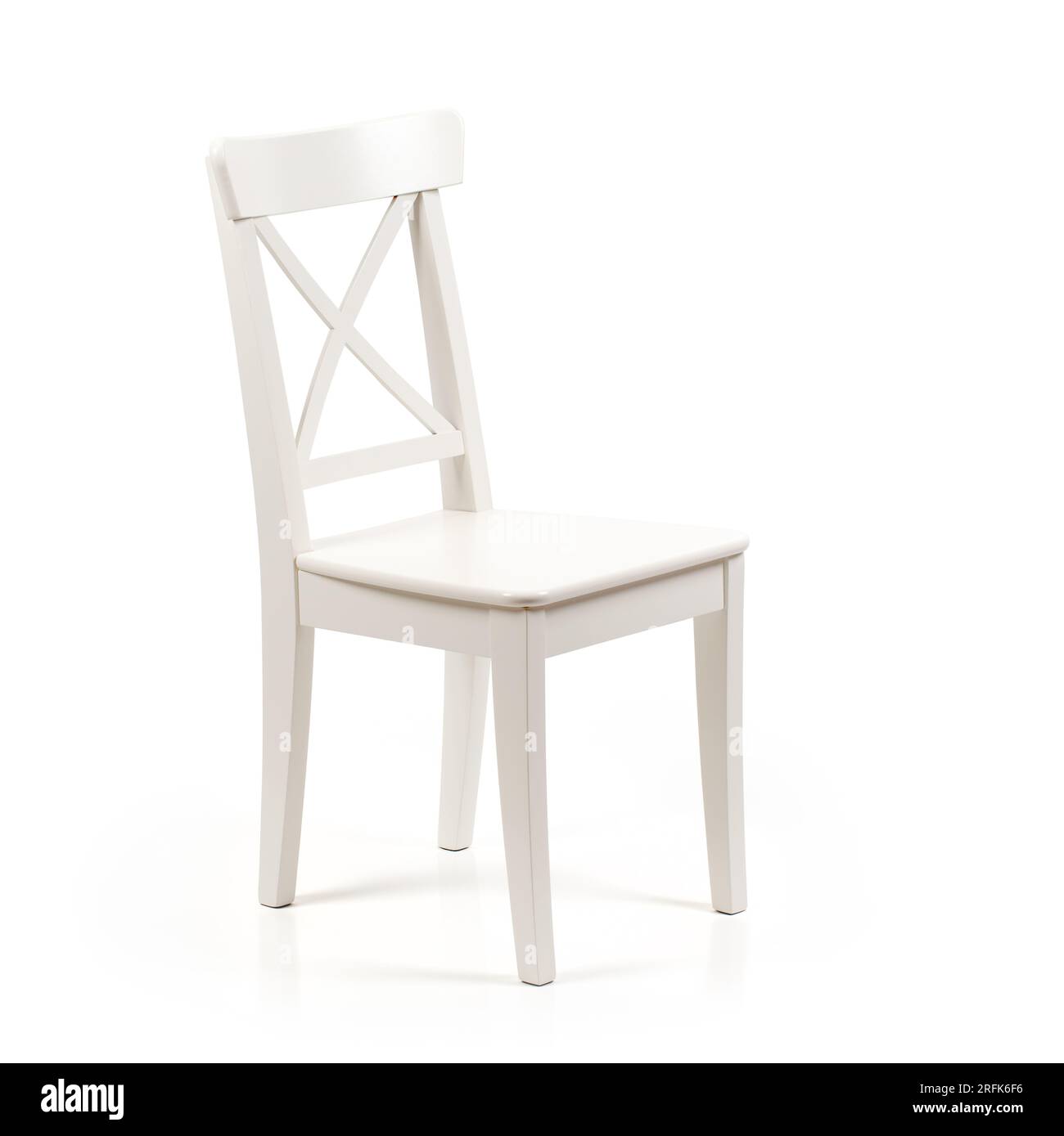 White wooden dining room chair isolated on white background studio