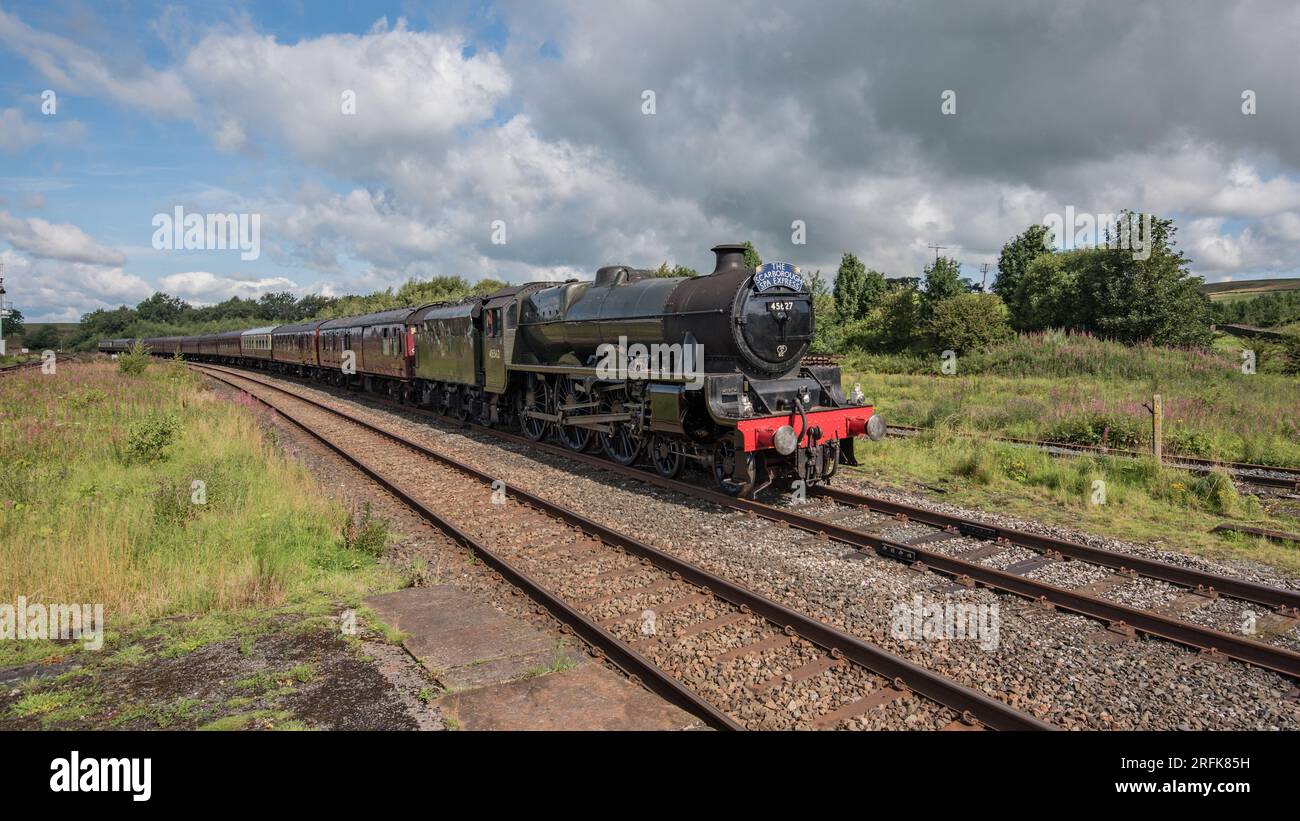 Scarborough Spa Express delayed arrival on 3rd August 2023 at Hellifield.Sierra Leone otherwise Galatea arriving from Carnforth to take on water. Stock Photo