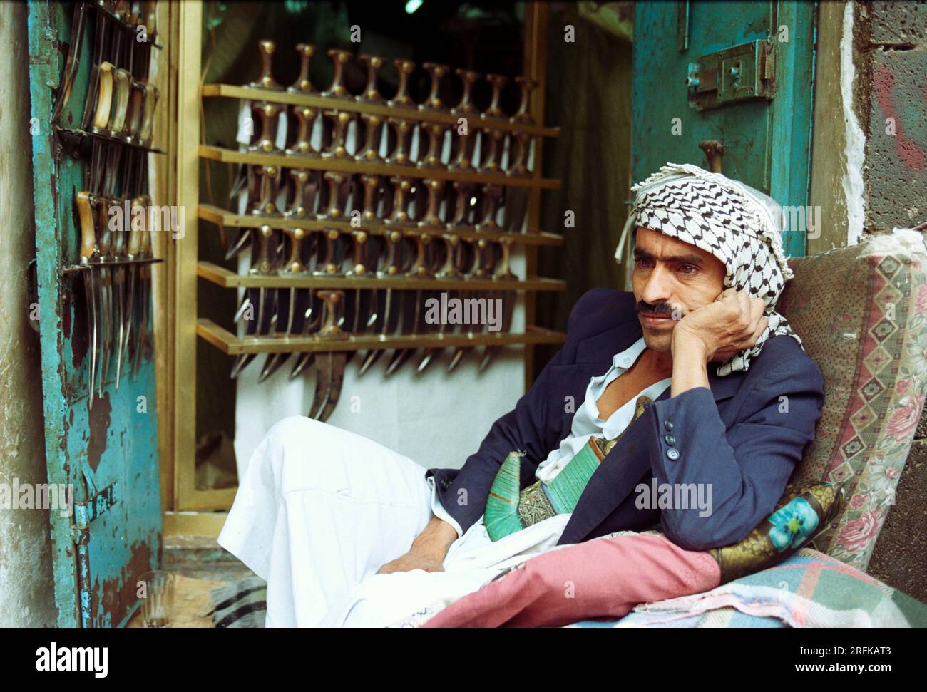 Men selling tribal daggers in the ancient old town of Sana'a, Yemen, Middle East Stock Photo