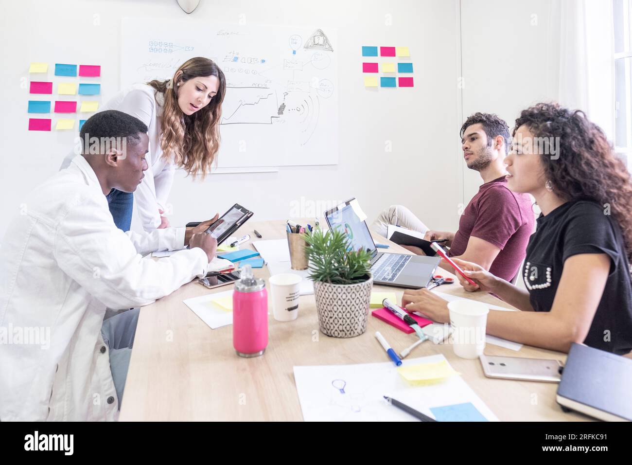 Happy people during a meeting presentation Stock Photo