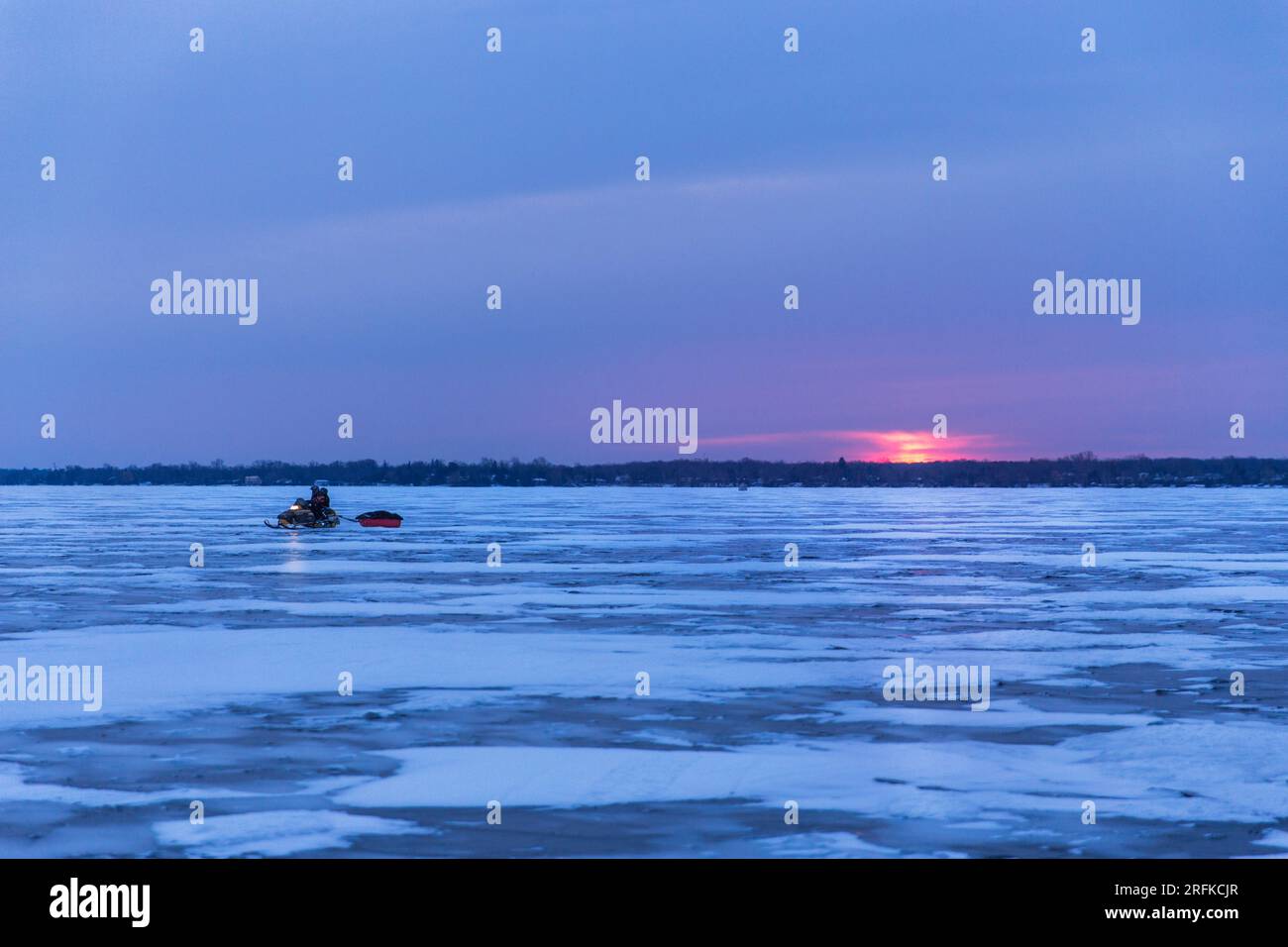 Sunrise over the frozen Lake Simcoe Stock Photo