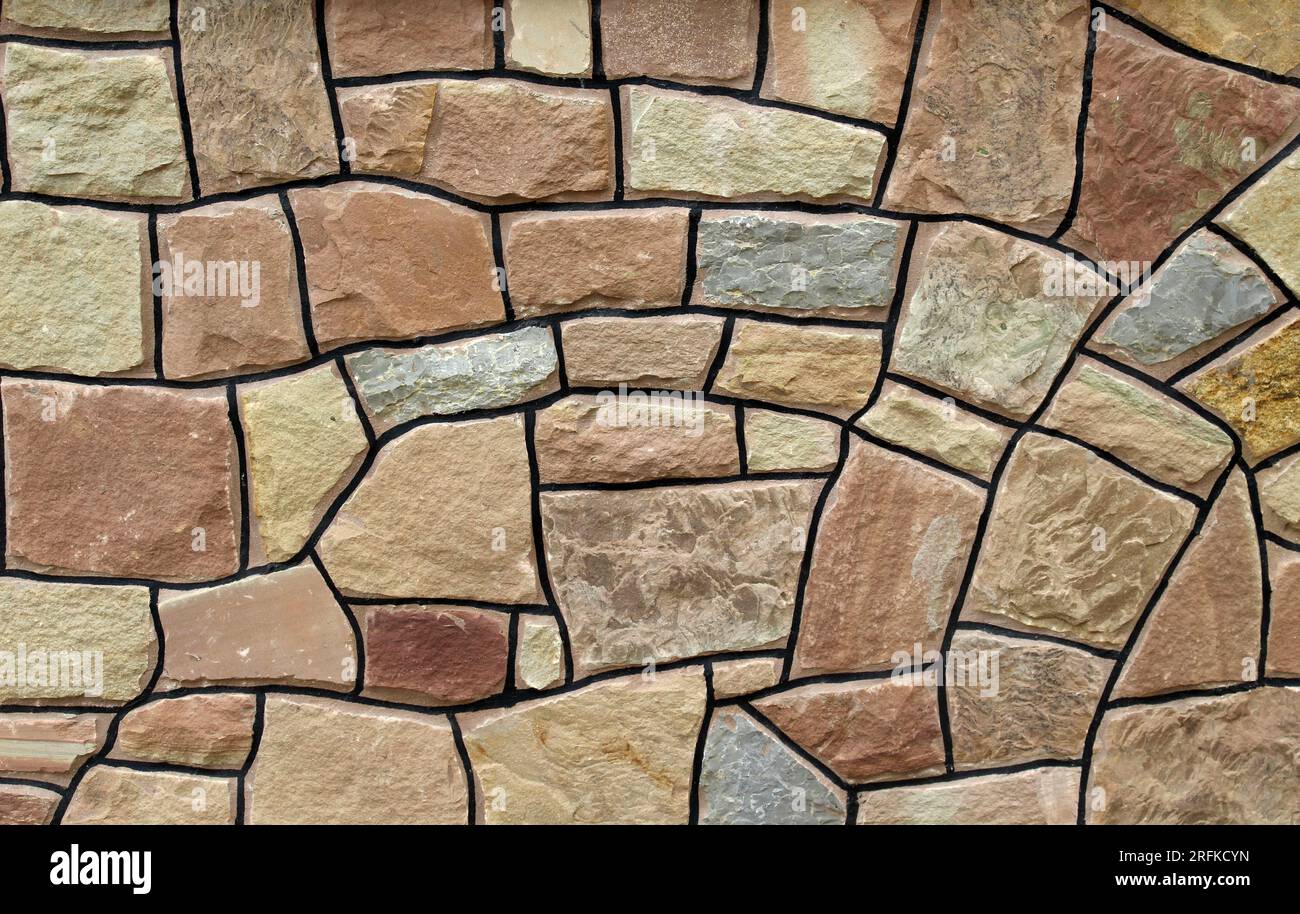 Split and processed red natural stone is used in construction Stock